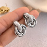 Intertwined circles stud earrings in stainless steel silver gold sold by pair
