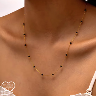Black crystal beads necklace in gold stainless steel
