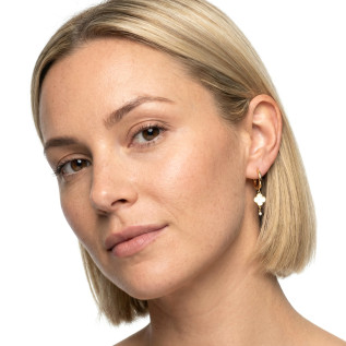 Small hoop earrings with white enamel clover pendants on stainless steel silver and gold sold in pairs