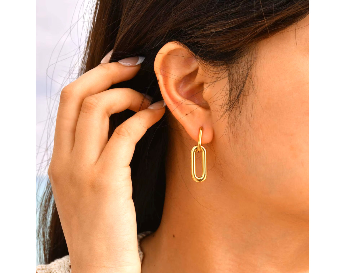 Intertwined rectangles hoop earrings in gold stainless steel sold by pair